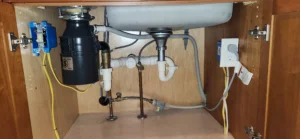 dishwasher backing up into garbage disposal sink