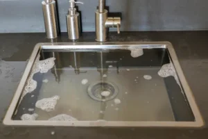 dishwasher backing up into garbage disposal sink