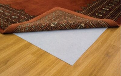 how do you keep a rug from moving on carpet