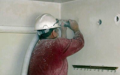 can you blow insulation into existing walls